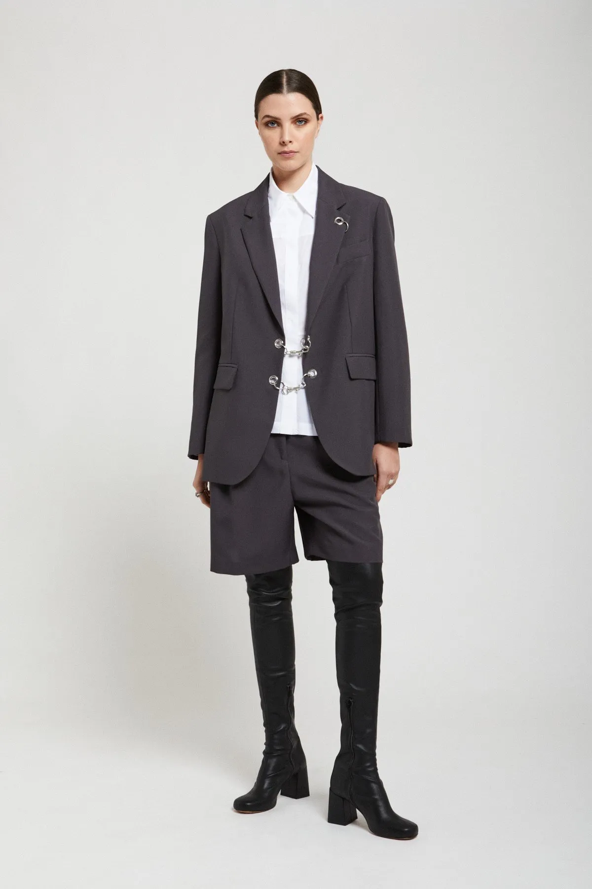Jacket with grommet and chain