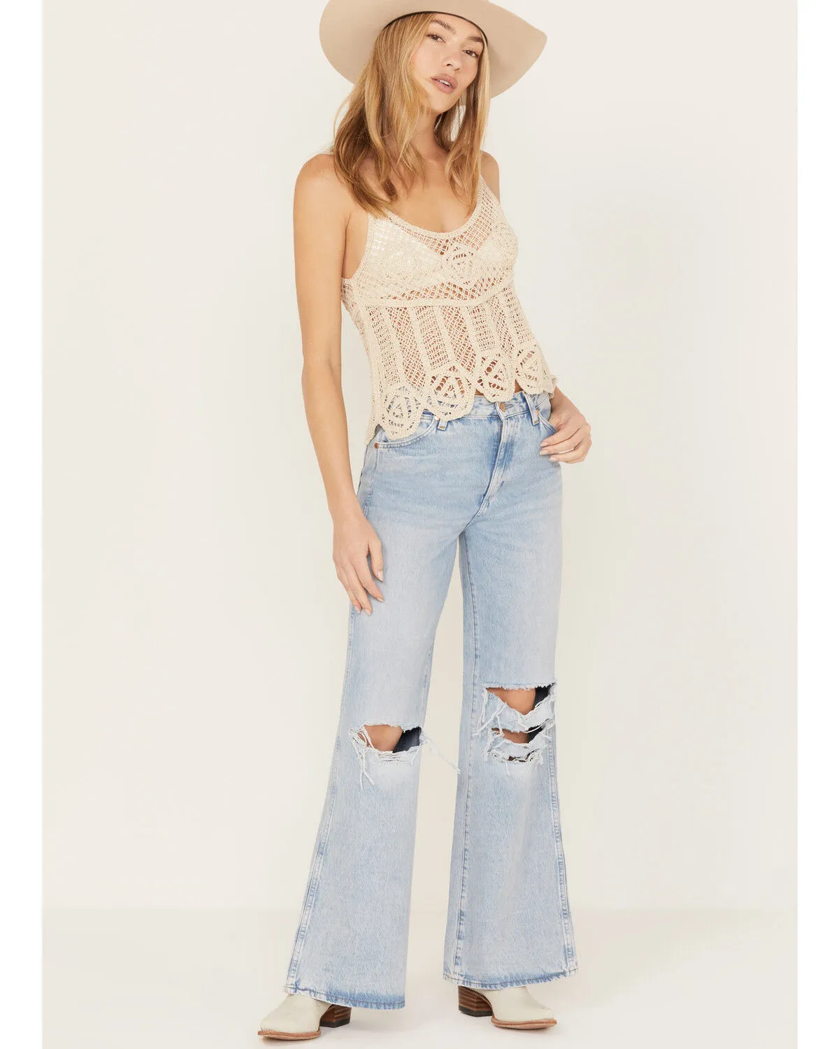 Product Name:  Wrangler Women's Light Wash Destructed Loose Flare Jeans