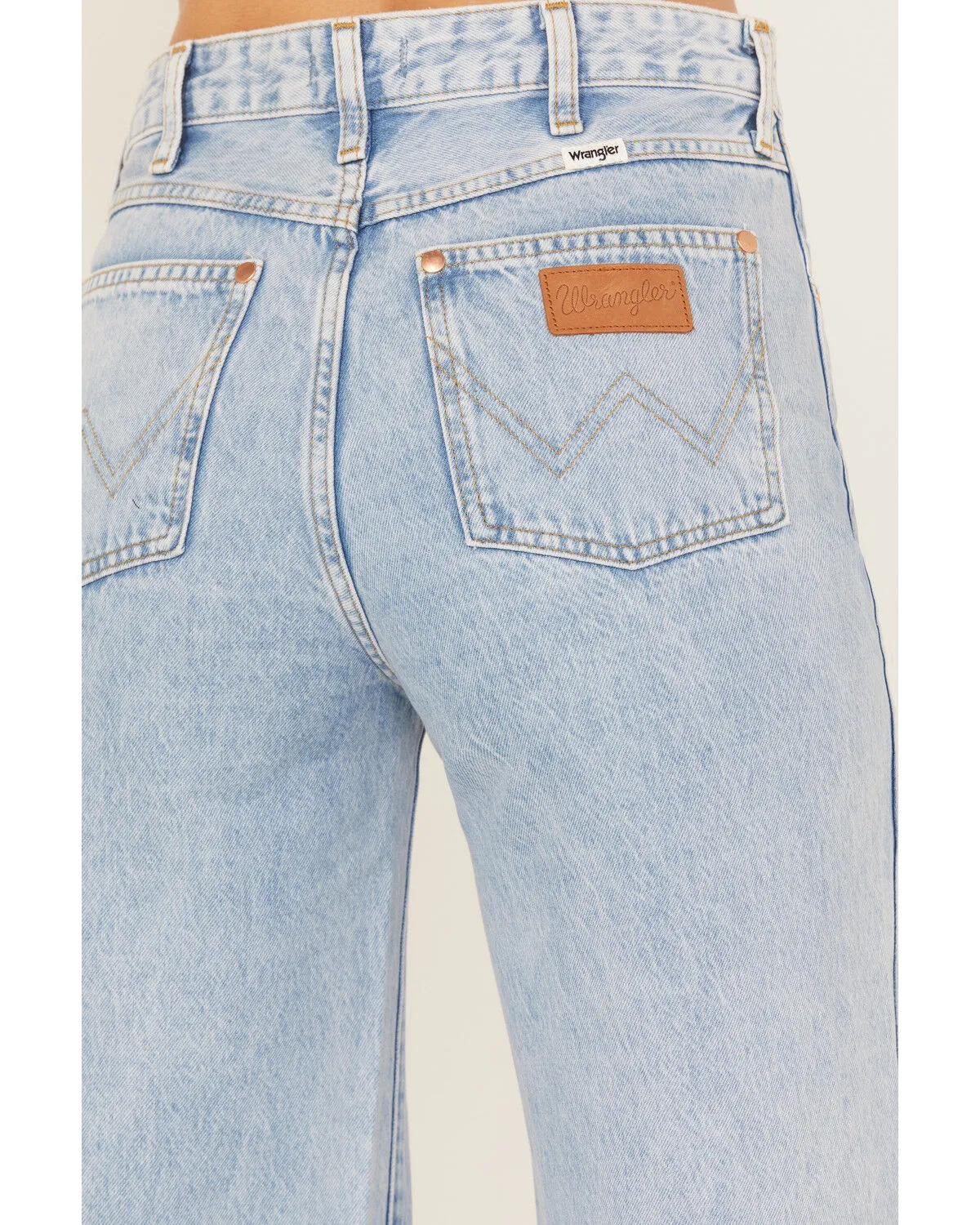 Product Name:  Wrangler Women's Light Wash Destructed Loose Flare Jeans