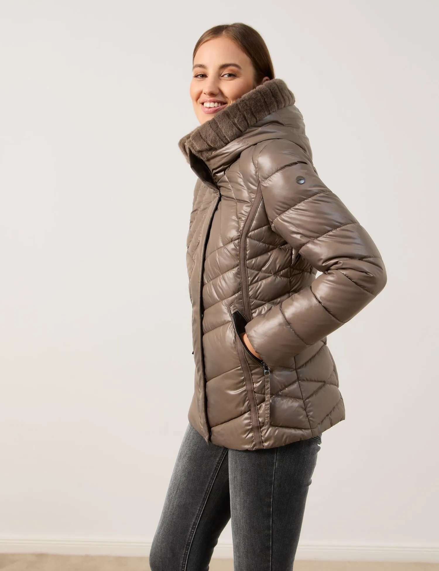 Shiny quilted jacket with faux fur