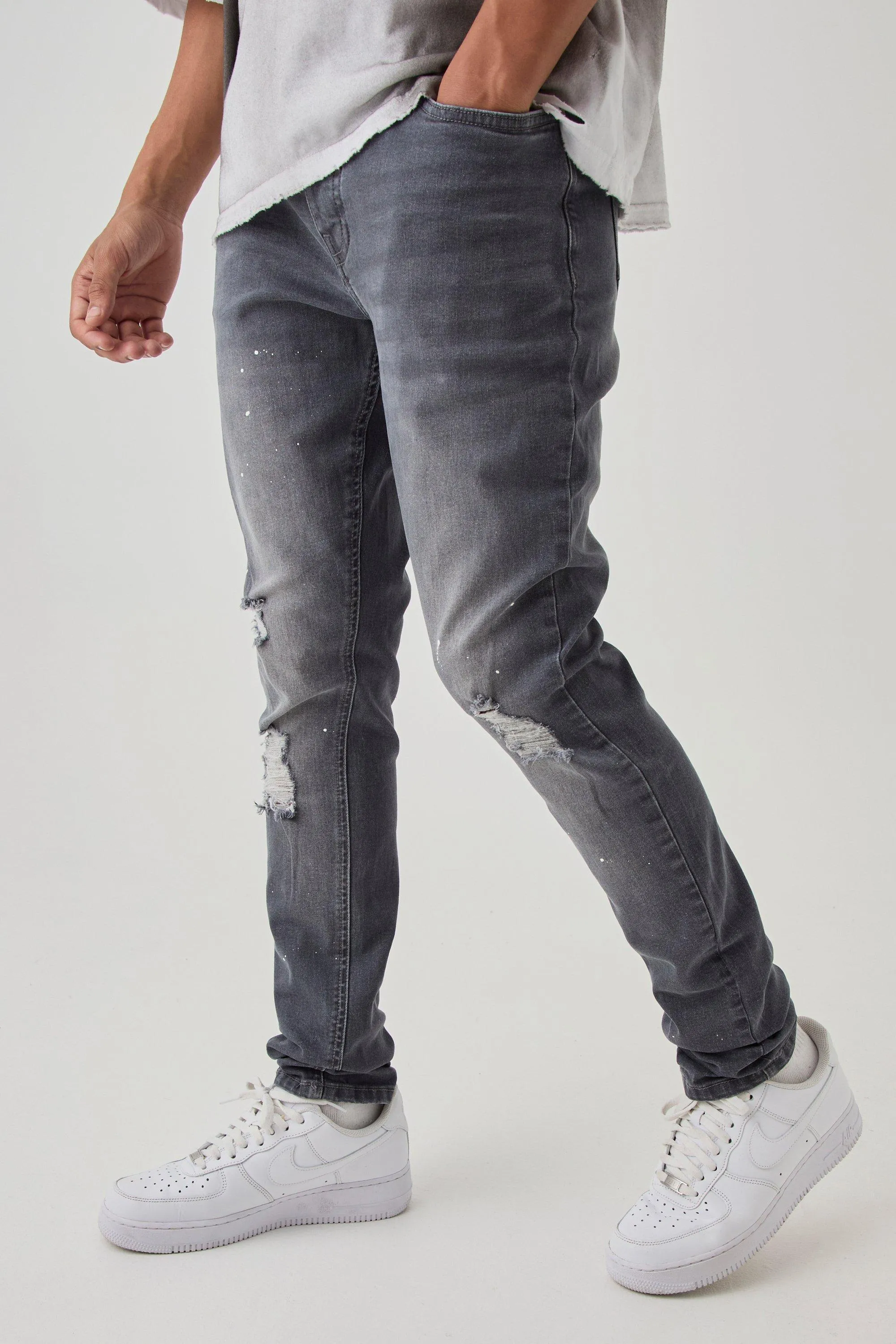 Skinny Stretch Stacked Distressed Paint Splatter Denim Jeans