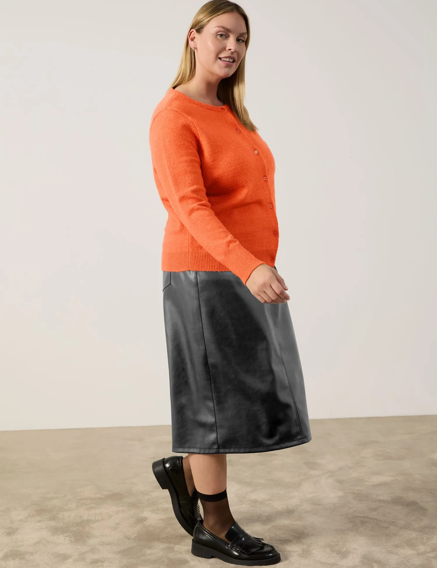 Warm cardigan with a button placket